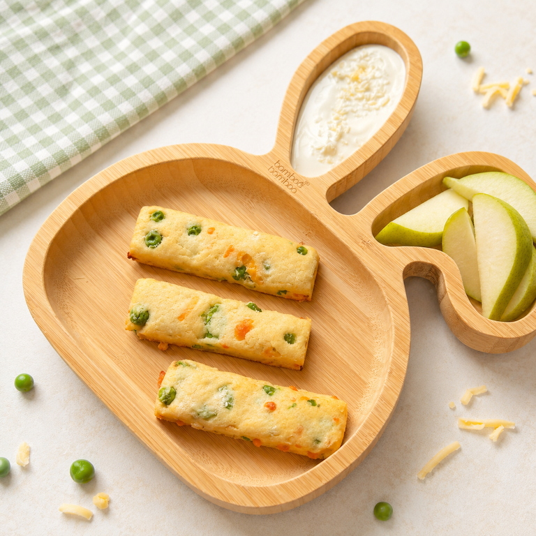 Pea and cheese breakfast biscuits served on a bamboo toddler plate